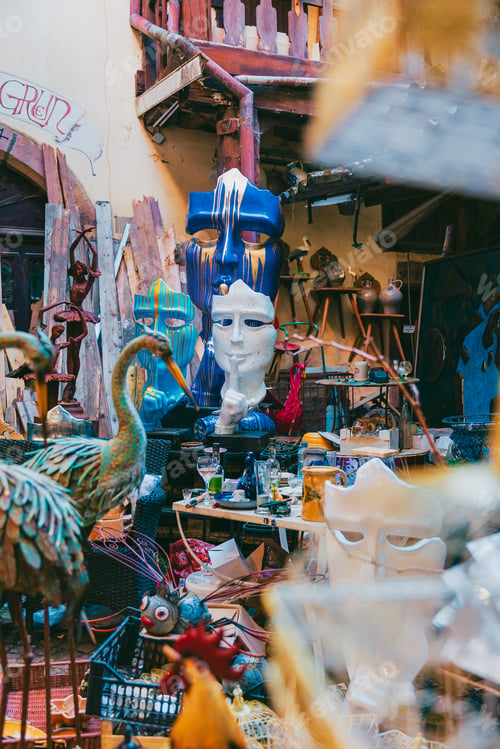 Preview: Traditional Alsatian decorative shop with hanging crafts and signs in Alsace Wine Region