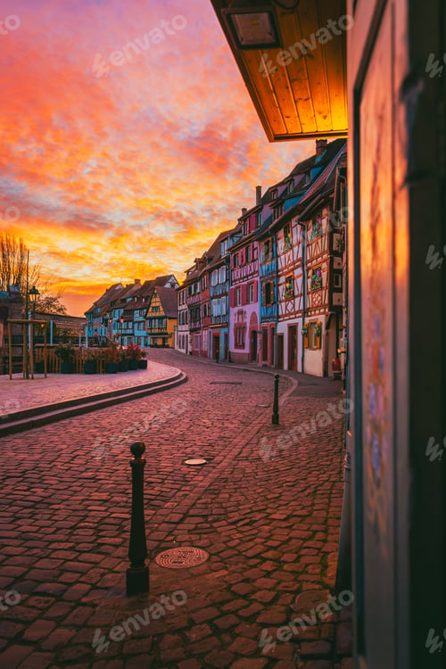 Preview: Dramatic fiery dawn sky over Colmar Petite Venise canal district in Alsace France