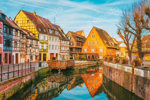 Preview: Colmar canal at morning with green trees and classic Alsatian reflections