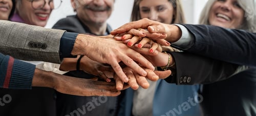 Preview: Diverse hands stacked together in teamwork gesture, business collaboration and unity
