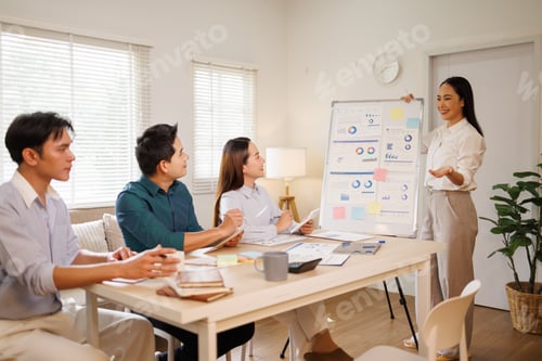 Preview: Business team collaborating during data analysis meeting and presentation