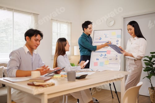 Preview: Business people collaborating on marketing strategy and data analysis