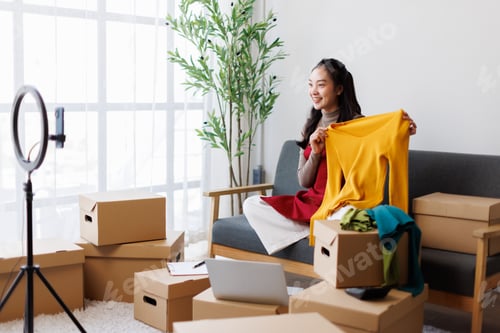 Preview: Young woman live streaming online clothing review to followers