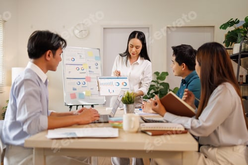 Preview: Business team presenting project data during a meeting