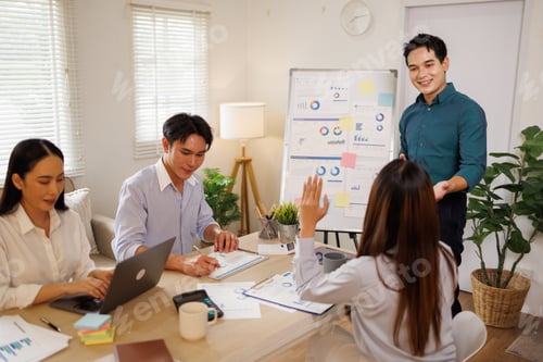 Preview: Business team collaborating on data analytics presentation
