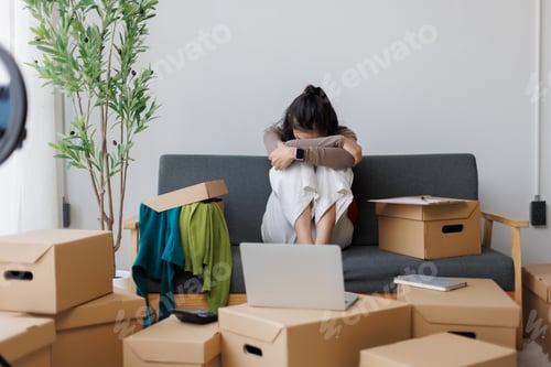 Preview: Stressed woman experiencing business failure and eviction