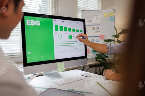 Preview: Business people analyzing esg data for sustainable investment strategy