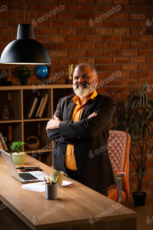 Preview: Portrait of Successful Indian Entrepreneur Showing Thumbs Up in Cozy Office