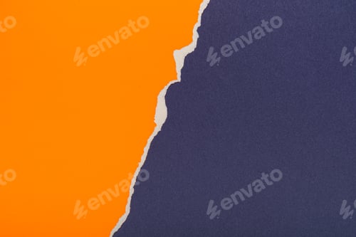 Preview: Torn orange paper on a blue background.