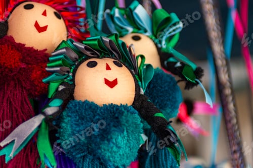Preview: Colorful Textile Lele Dolls Displayed for Cultural Sale in a Market Setting