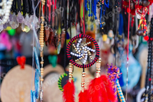 Preview: Detailed Traditional Decorative Dreamcatcher With Red Feathers and Beaded Ornamentation
