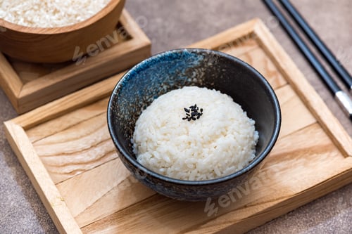 Preview: Cooked White Rice with Black Sesame on Wooden Tray Traditional Asian Style
