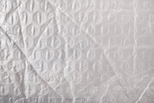 Preview: Close-up view showing textured surface of white bubble wrap packaging material