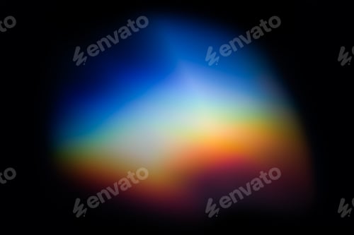 Preview: Abstract light refraction creating blurred colorful spectrum on dark background