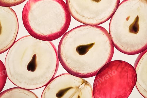 Preview: Red grapes creating vibrant translucent pattern with seeds visible