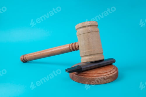 Preview: Wooden Judge Gavel On Electronic Cigarette Vaping Law Concept