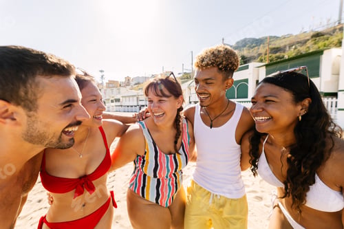 Preview: Happy diverse friends enjoying refreshing summer vacation at beach