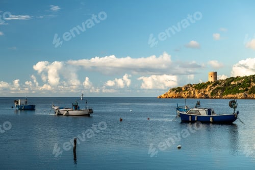Preview: Coastal Tower and Moored Boats in Sardinia, Italy