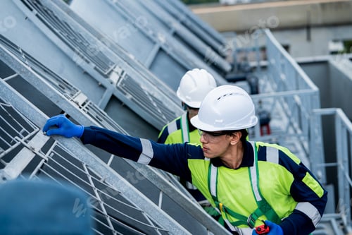 Preview: HVAC Engineers Inspecting Industrial Ventilation System on Commercial Building Rooftop. HVAC mainte