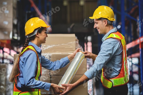 Preview: Caucasian Man and Woman Working at Factory, Warehouse, Warehouse. Warehouse Workers.