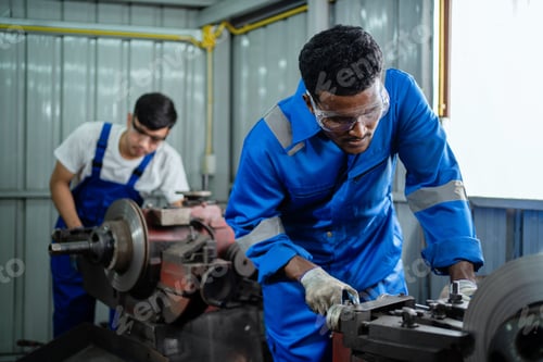 Preview: Industrial engineering teams wearing safety controls are working in large industrial plants with a l