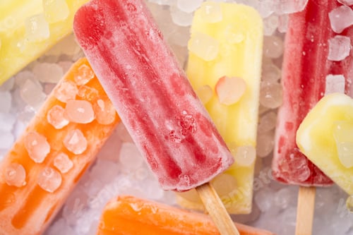 Preview: Colorful fruit popsicles on crushed ice