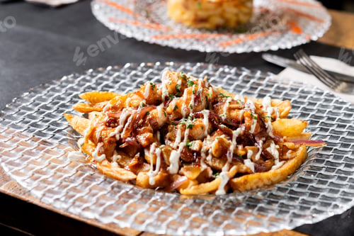 Preview: Loaded French Fries with Chicken, Caramelized Onion and Garlic Sauce