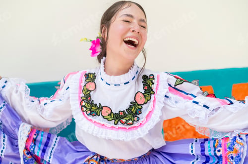 Preview: Woman dancing traditional folk dance enjoying celebration in South America