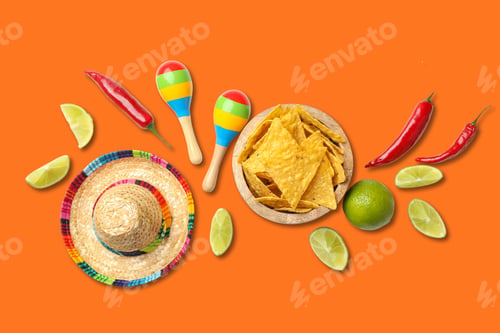 Preview: Nachos, lime, maracas, and chilies arranged for Cinco de Mayo