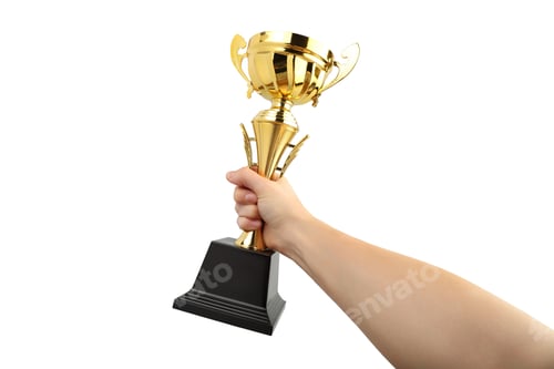 Preview: Gold trophy held firmly in a hand showcasing victory, on white