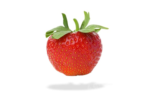 Preview: Fresh red strawberry with green leaves on top, on white