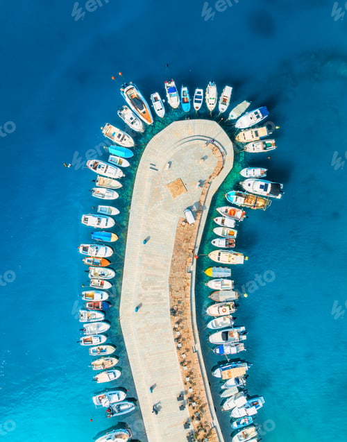 Preview: Aerial view of boats and yachts in dock at sunset in summer