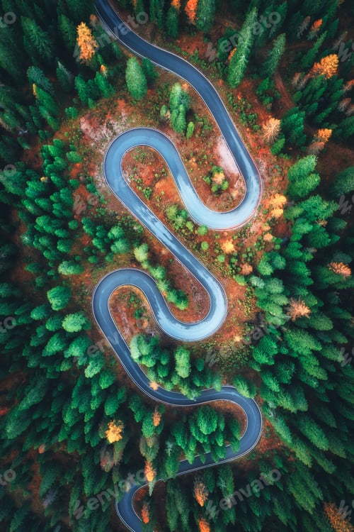 Preview: Aerial drone view of winding serpentine road in Dolomites, Italy