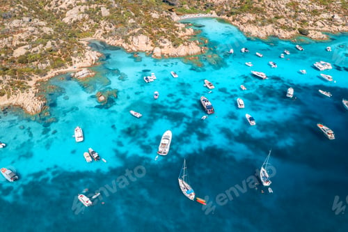 Preview: Aerial view of luxury yachts and boats on blue sea, island