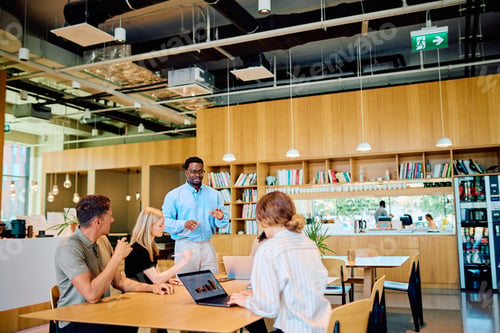 Preview: Business professionals collaborating during an office meeting presentation