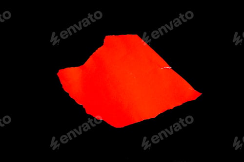 Preview: Close up of a red ripped or torn piece of paper with copy space, isolated black background.