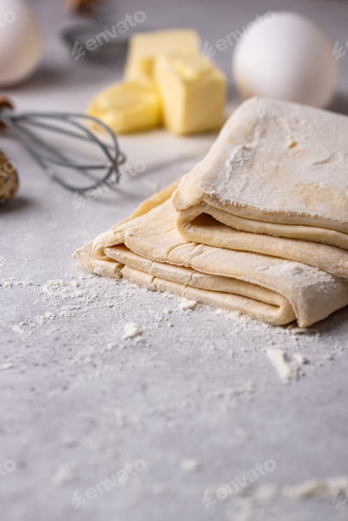 Preview: Fresh Homemade Puff Pastry Dough with Baking Ingredients