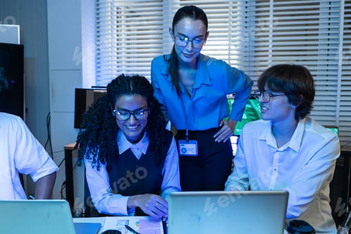 Preview: Team colleagues having cheerful conversation in the office