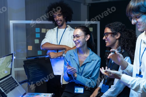 Preview: Tech team clapping after meeting success