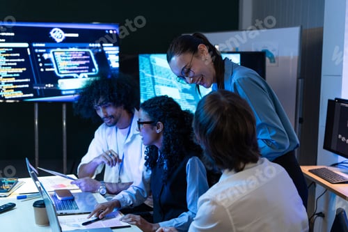 Preview: Team developer sharing idea and discussing AI code at the office