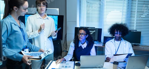 Preview: Diverse team analyze coding data during night meeting