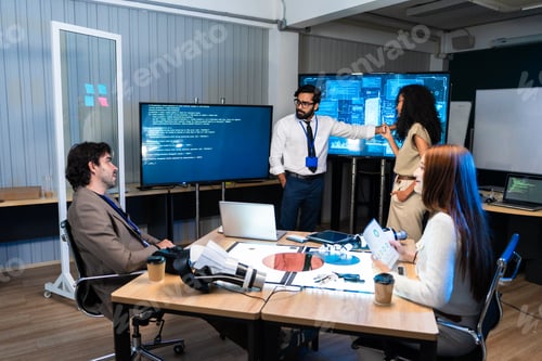 Preview: Developer team presenting and explaining AI project at the office