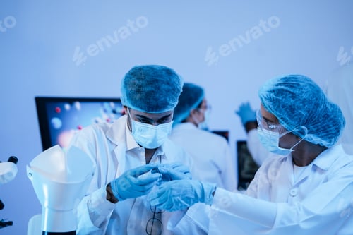 Preview: Scientist research medical technology on robotic arm at the lab