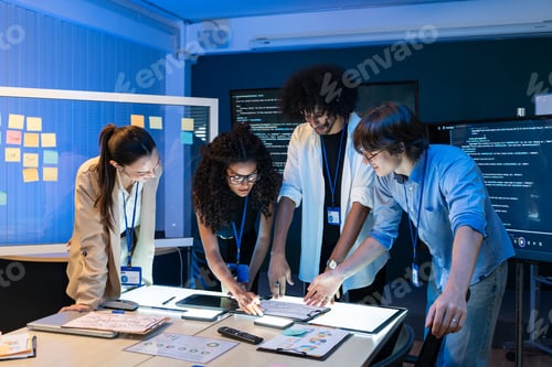 Preview: Technical team brainstorming and reviewing business project at the meeting