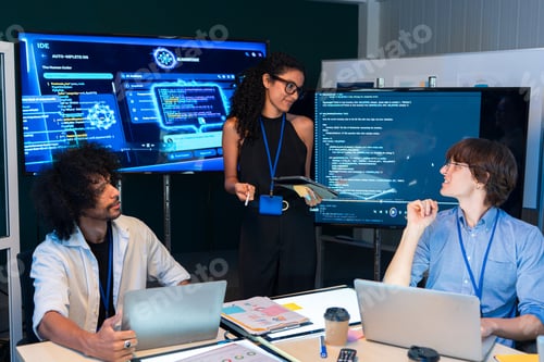 Preview: Tech team brainstorming software code at the meeting
