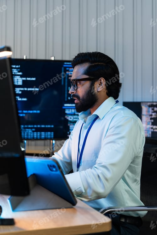 Preview: Indian programmer typing on keyboard