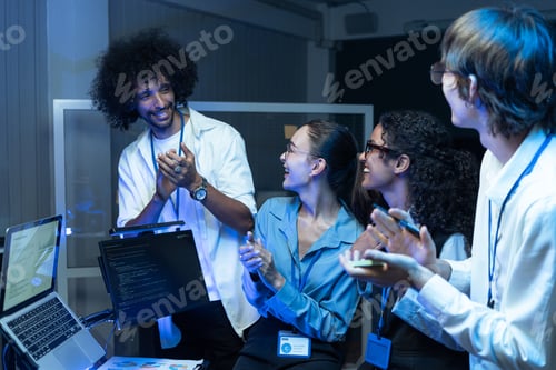 Preview: Developer team clapping for project success