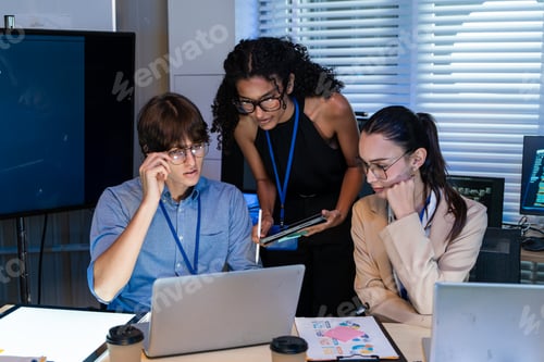 Preview: Tech team brainstorming work on the laptop