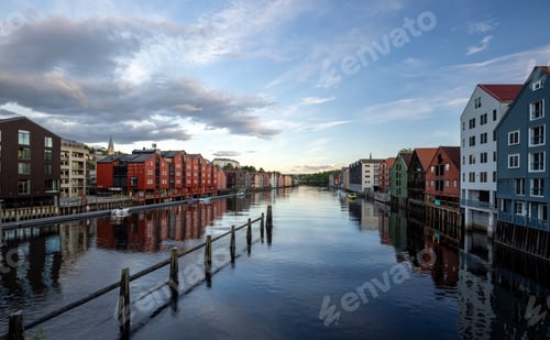 Preview: Calm River Reflections with Colorful Waterfront Houses