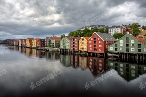 Preview: Traditional Scandinavian Wooden Houses Reflected in Calm River